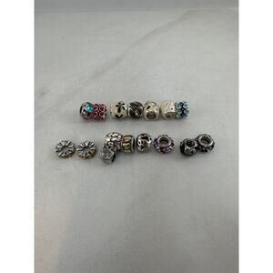 Lot of 16 charm beads and spacer beads